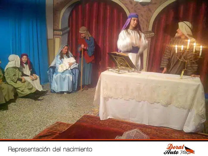 Representación del Nacimiento del Niño Jesús en Menorca: María y San José en un belén viviente tradicional.